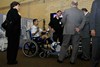 Attendees check out the Electrical Stimulation Bicycle