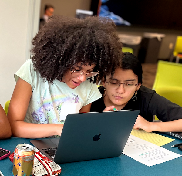 students study at a laptop