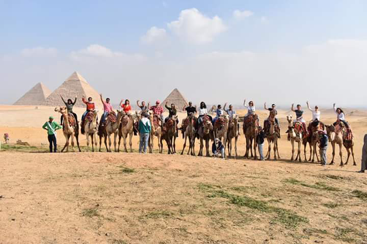 Ms. Uddin riding a camel