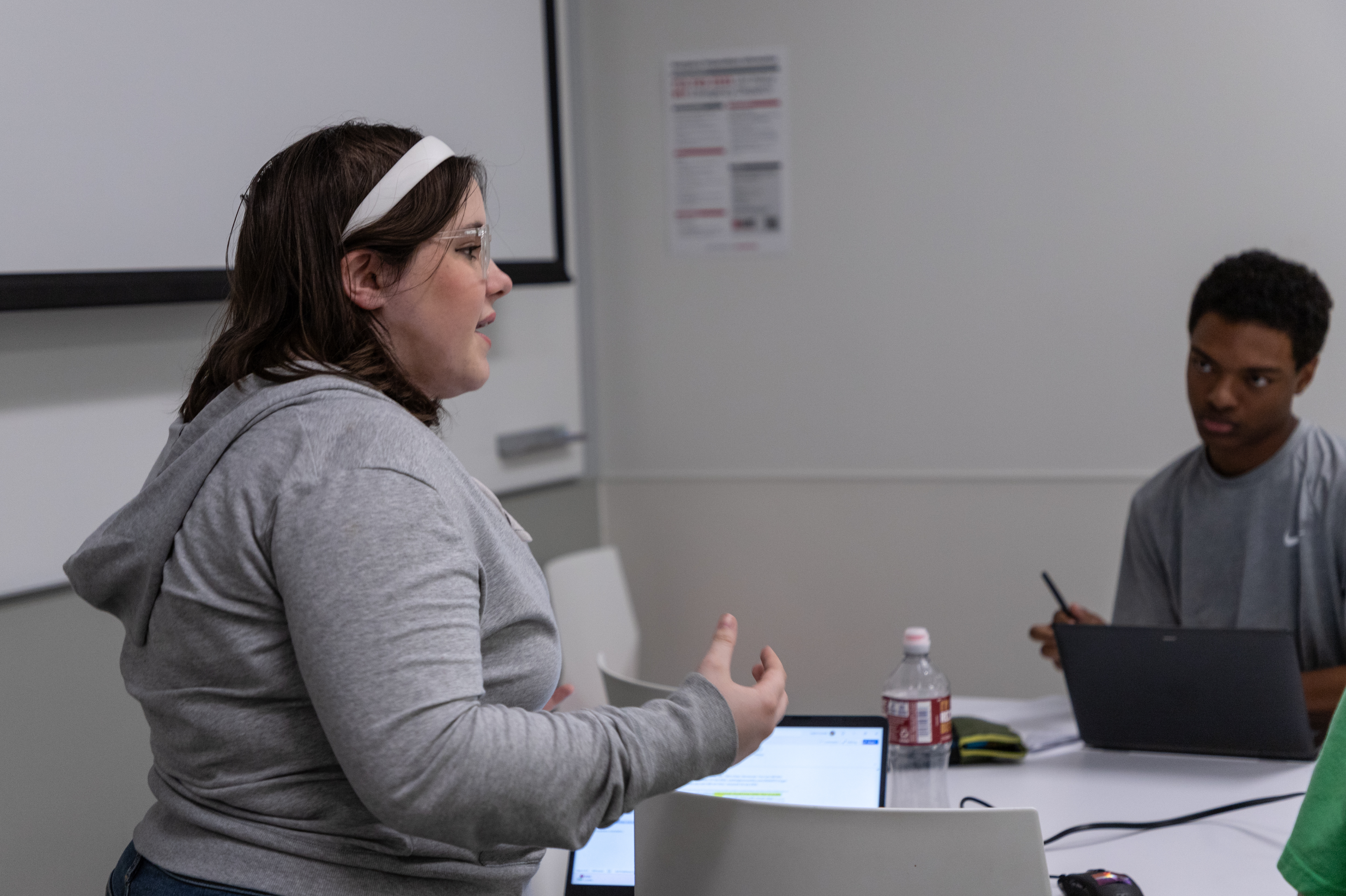 high school students in class practicing debating skills