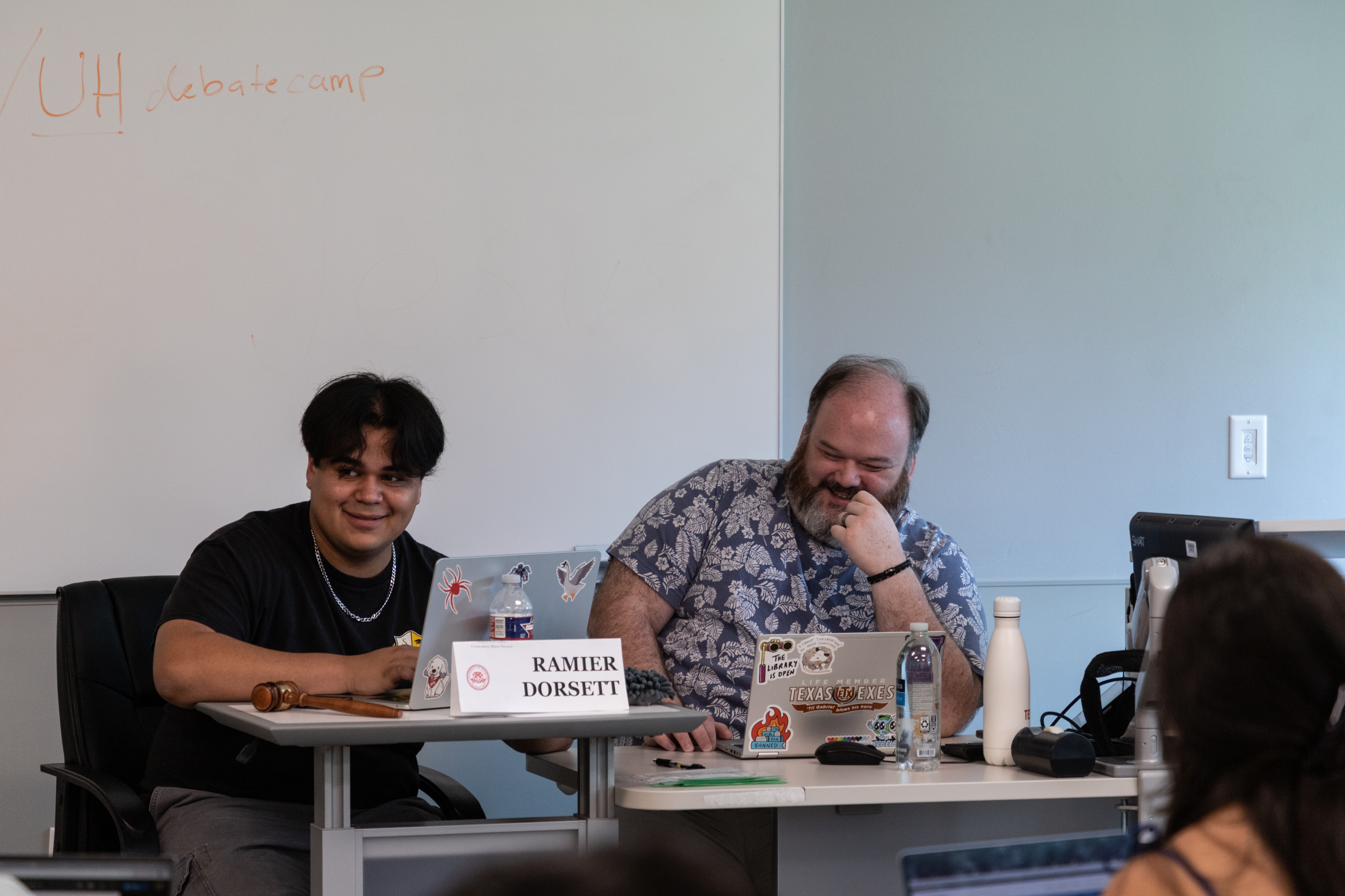 debate instructors in class