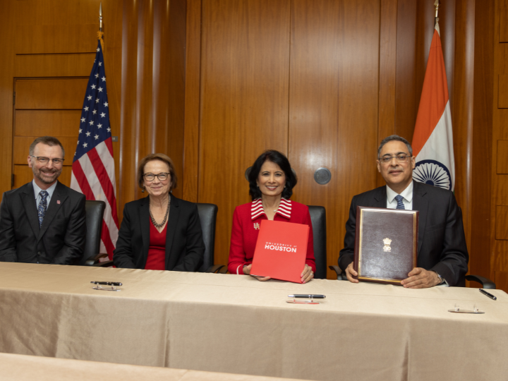 mou signing wide shot